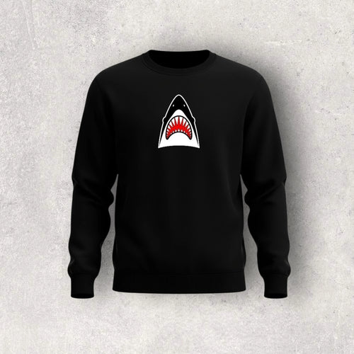 Black sweatshirt with a shark graphic on a gray background