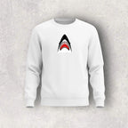 White sweatshirt with a shark graphic on a gray background