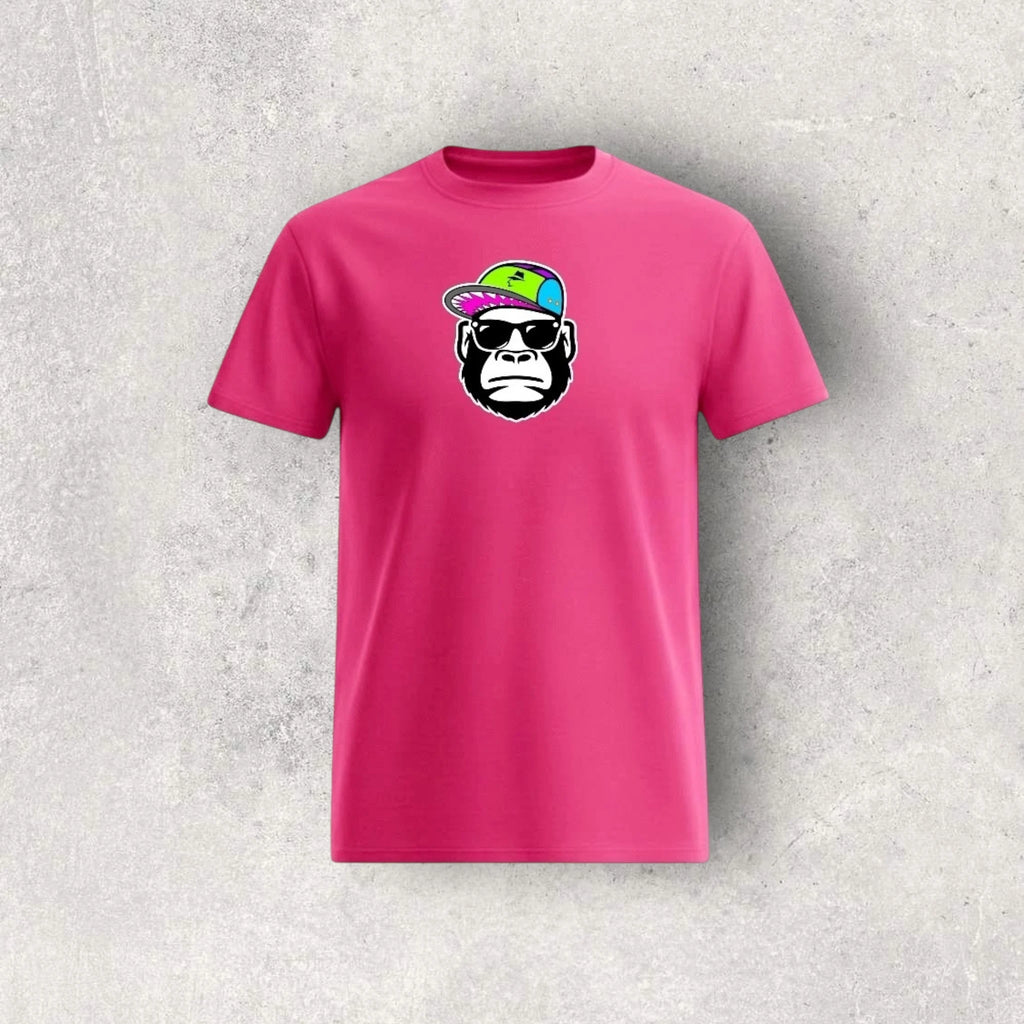 Pink t-shirt with a graphic of a monkey wearing sunglasses and a colorful hat on a gray background