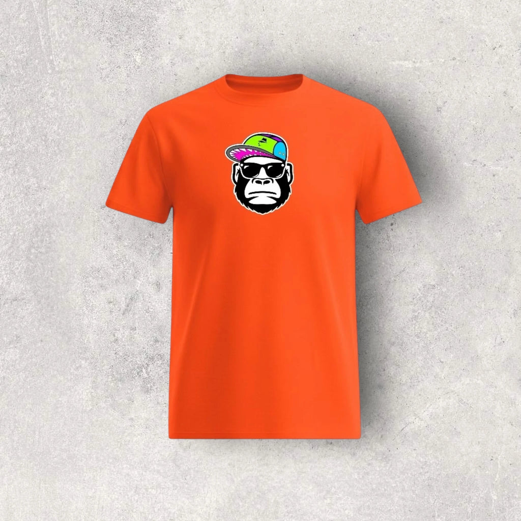 Orange t-shirt with a graphic of a monkey wearing sunglasses and a colorful hat on a textured gray background.