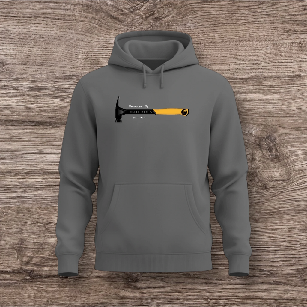 Gray hoodie with a hammer graphic on a wooden background