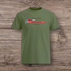 Army green t-shirt with a plumber wrench design on a wooden surface