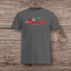 Gray t-shirt with a plumber wrench design on a wooden surface