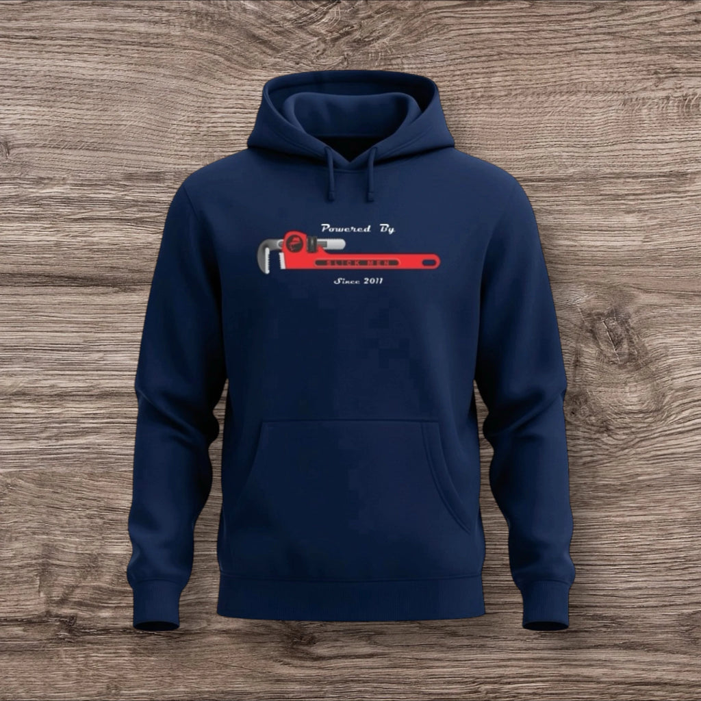 Navy blue hoodie with a plumber wrench graphic on a wooden surface