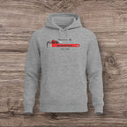 Sport gray hoodie with a plumber wrench design on a wooden surface