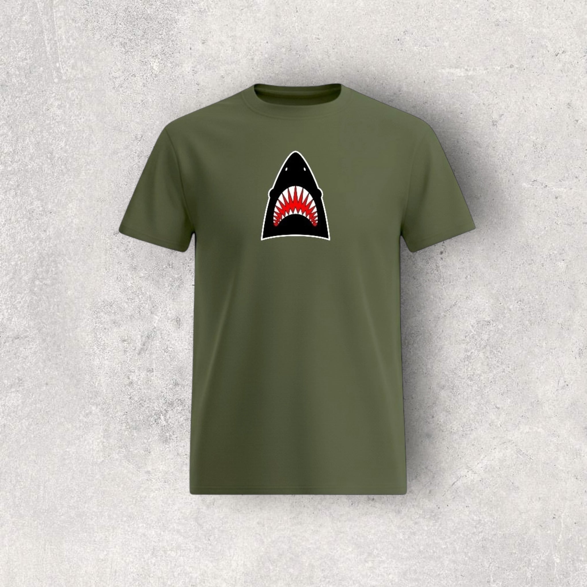 Army Green t-shirt with a shark graphic on a textured gray background