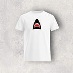 White t-shirt with a shark graphic on a gray textured background