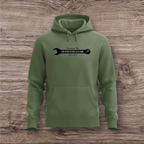 Green hoodie with a black wrench graphic on a wooden surface