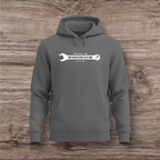 Gray hoodie with a white wrench graphic on a wooden surface