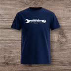 Navy blue t-shirt with a white wrench graphic on a wooden surface
