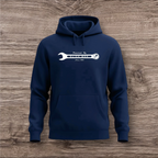 Navy blue hoodie with a white wrench graphic on a wooden surface