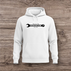 White hoodie with a black wrench graphic on a wooden surface